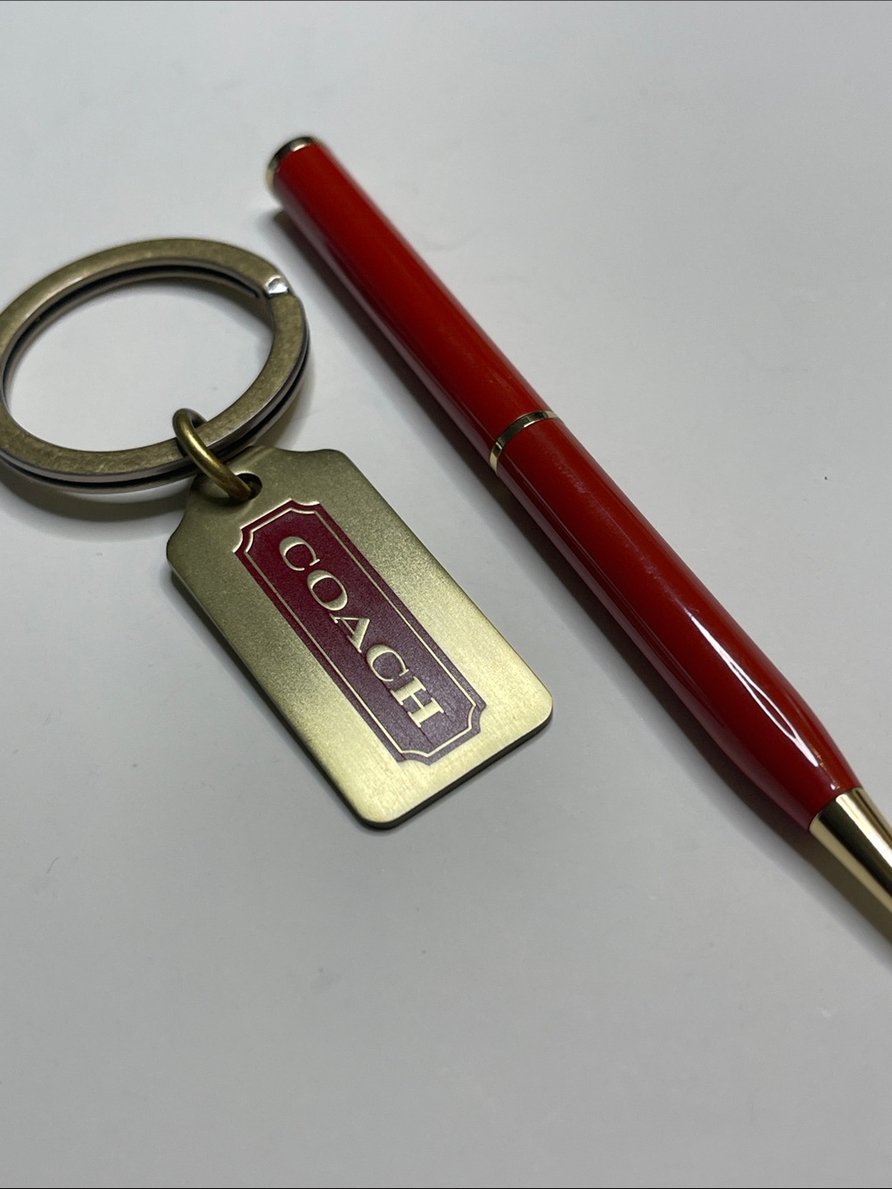 COACH Red Enamel Tag Key Ring - Brass Finish and Coach Pen